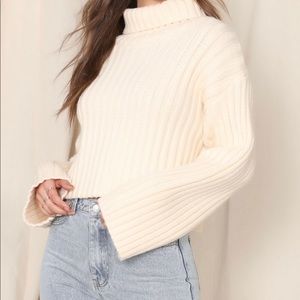 Brand new with tag attached cream turtle neck sweater